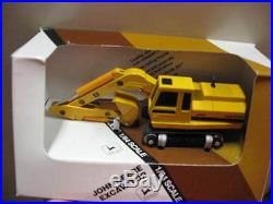1/64 John Deere 690C excavator by Ertl, older, new in package, hard to find