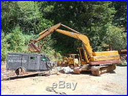 John Deere 690B excavator. 600 hours on new engine. 30 digging bucket