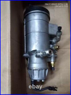 John Deere Original Equipment Fuel Filter housing Assembly #RE504494